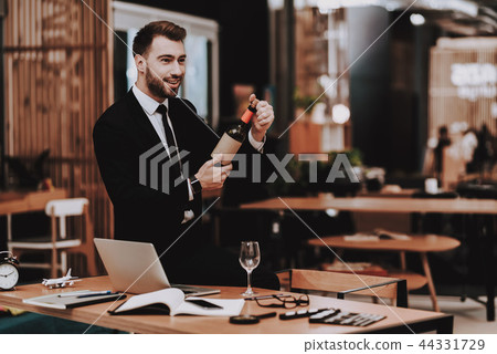 Glass. Bottle of Wine. Business Suit. Laptop. 44331729