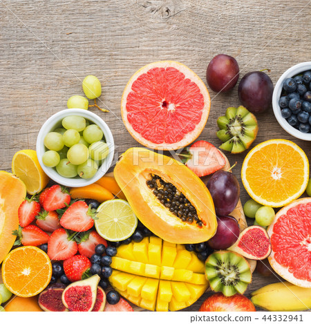 Rainbow fruits top view on grey 44332941