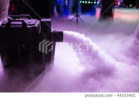 Dry ice low fog machine with hands on for wedding first dance in restaurants Dry ice low fog machine with hands on for wedding first dance in restaurants 44333401