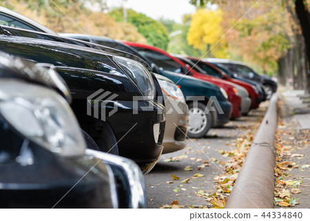 Cars in a row on parking close up 44334840