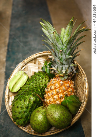 Tropical fruit on a floor 44339684