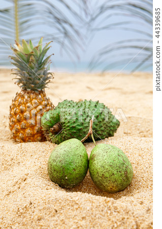 Bael, pineapple and saucep 44339685