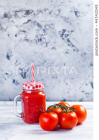 Tomato juice and grape of tomatoes 44342048