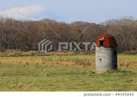 An old silo that remains in a pasture field in the Soya district of Hokkaido An old silo that remains in a pasture field in the Soya district of Hokkaido 44345043