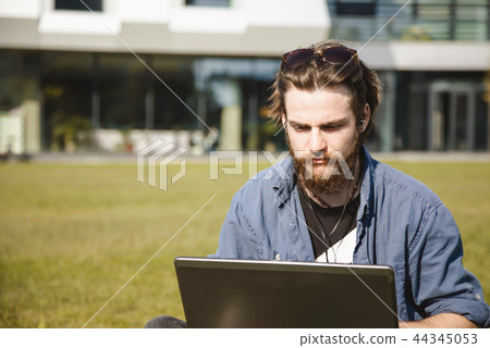 Bearded Man Working With Laptop Bearded Man Working With Laptop 44345053