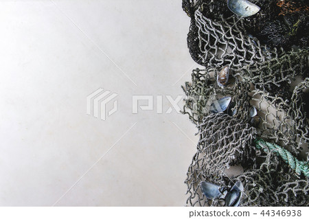 Old sea fishing nets 44346938