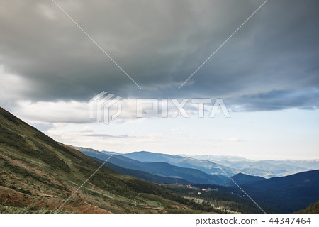 Panoramic view of the clouds above the mountains and hills 44347464