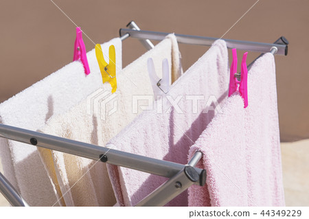 Drying clean clothes after washing 44349229