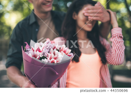 Beautiful flowers in the hands of kind loving man Beautiful flowers in the hands of kind loving man 44350696