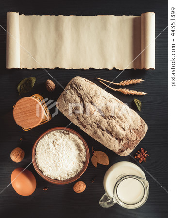 bread and bakery products on wood 44351899