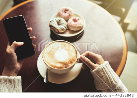 Spending time in cafe Spending time in cafe 44352948