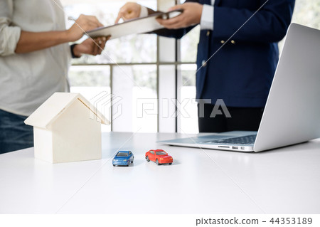 Car and Home for rent concept, broker agent presenting and consu 44353189