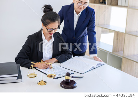 Teamwork of business lawyer colleagues, consultation and confere 44353194