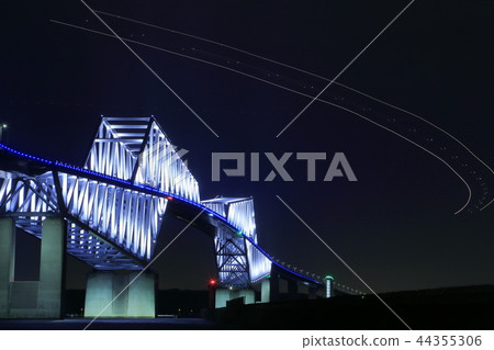Tokyo Gate Bridge and the trajectory of the plane seen from Wakasu Park 44355306