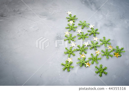 Decorative Christmas tree on a gray background. 44355316