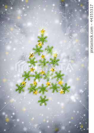 Decorative Christmas tree on a gray background. Decorative Christmas tree on a gray background. 44355317