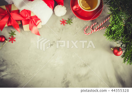 Christmas background. Santa's cap and decorations Christmas background. Santa's cap and decorations 44355328
