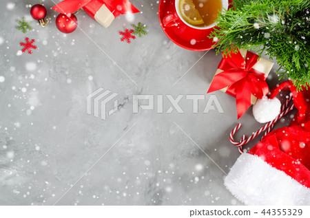 Christmas background. Santa's cap and decorations 44355329