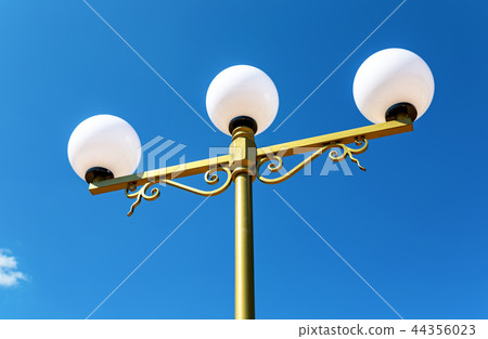 Street lamp against the blue sky 44356023