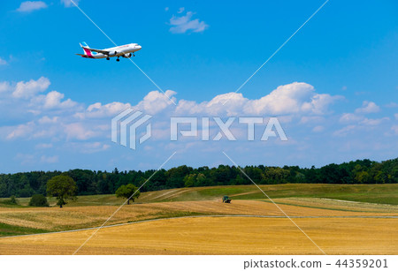 Eurowings airlines airplane preparing for landing at day time in international airport Eurowings airlines airplane preparing for landing at day time in international airport 44359201