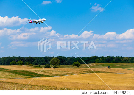 Eurowings airlines airplane preparing for landing at day time in international airport 44359204