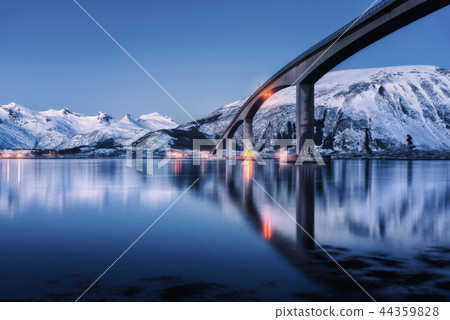 Bridge with illumination and mountains at night Bridge with illumination and mountains at night 44359828