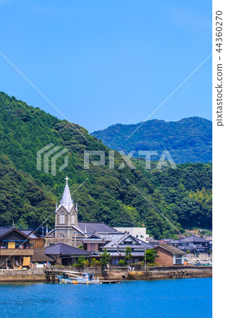 World Heritage site with a view of the Catholic Aizu Church and Aizu village [Amakusa City, Kumamoto Prefecture] 44360270