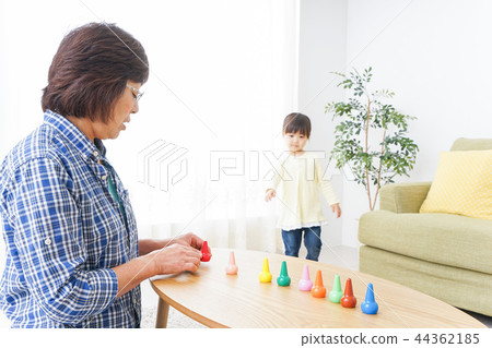 Child playing with grandma Child playing with grandma 44362185