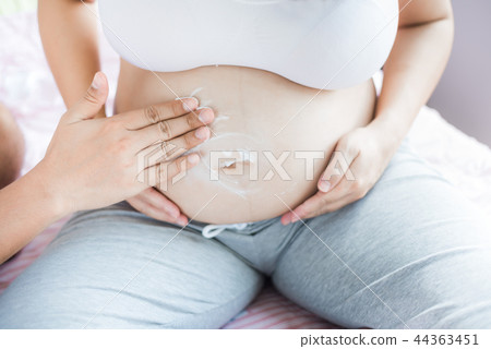 Asian pregnant woman with big belly. Relax at home 44363451