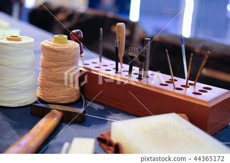 leather craft DIY instrument tool. craftsman working desk 44365172