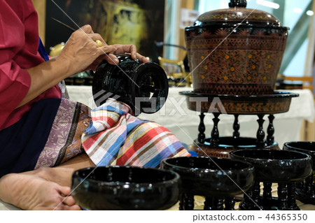 craftsman carving pattern on traditional Thailand tray craftsman carving pattern on traditional Thailand tray 44365350