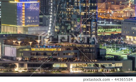 Aerial skyline of Abu Dhabi city centre from above night timelapse Aerial skyline of Abu Dhabi city centre from above night timelapse 44365584