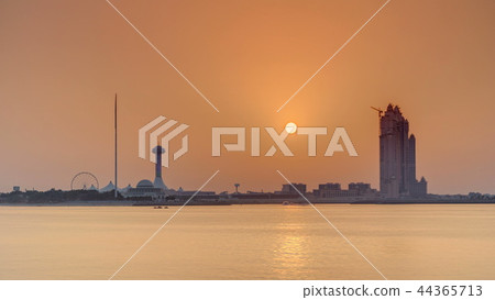 Sunset in Abu Dhabi over Marina Island timelapse 44365713