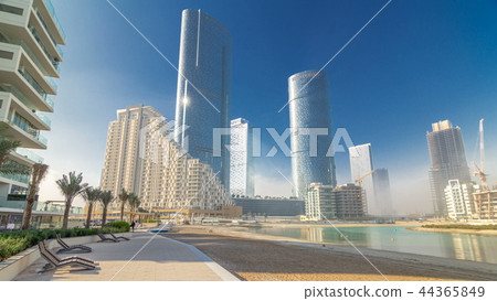 Buildings on Al Reem island in Abu Dhabi timelapse hyperlapse 44365849