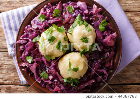 Delicious potato dumplings with red cabbage 44367768
