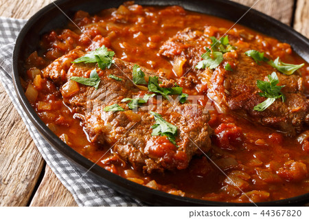 Classic Swiss steak fried and slowly cooked 44367820