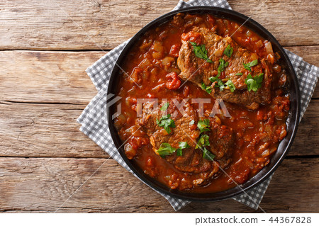 Smothered food Swiss steak in a spicy tomato sauce Smothered food Swiss steak in a spicy tomato sauce 44367828