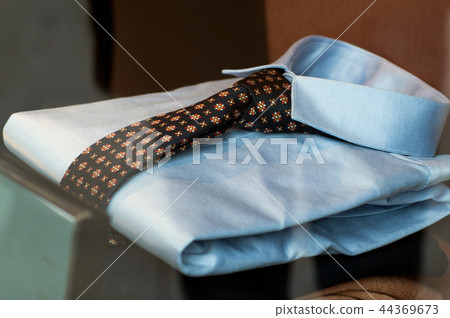 blue shirt and tie in a fashion store showroom blue shirt and tie in a fashion store showroom 44369673
