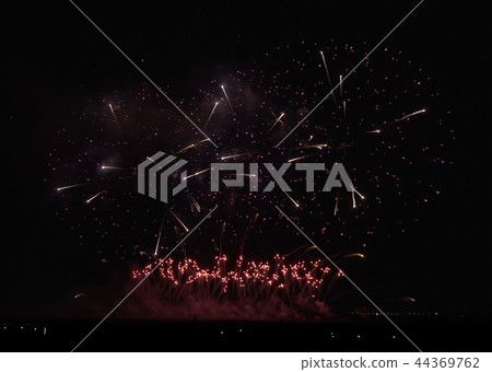 Colorful fireworks on the black sky background Colorful fireworks on the black sky background 44369762