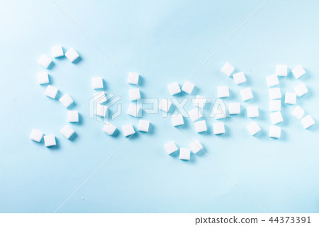 Sugar on blue background 44373391