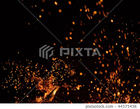 Burning sparks flying. Beautiful flames background. 44375436