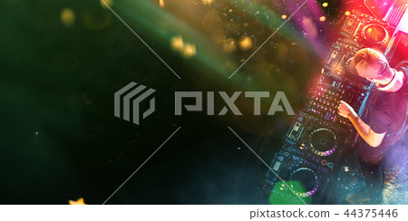 Dj mixes the track in the nightclub at a party 44375446