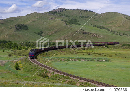 Freight train running in Mongolia Freight train running in Mongolia 44376288