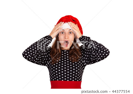 emotional girl in santa christmas hat isolated 44377554