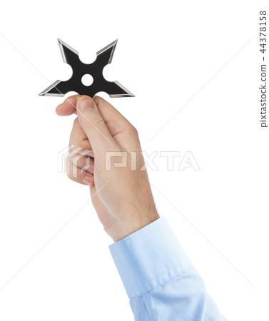 Hand is throwing ninja shuriken Hand is throwing ninja shuriken 44378158