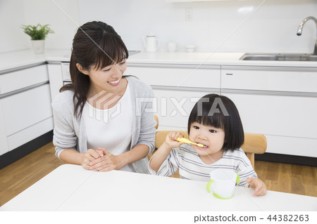 3-year-old girl brushing teeth 3-year-old girl brushing teeth 44382263
