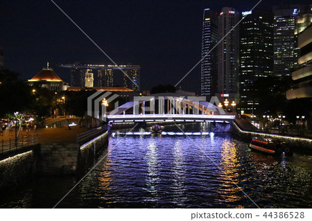View over Marina Bay Sands and high-rise buildings over the North Bridge over the Singapore River where Bumboats run View over Marina Bay Sands and high-rise buildings over the North Bridge over the Singapore River where Bumboats run 44386528