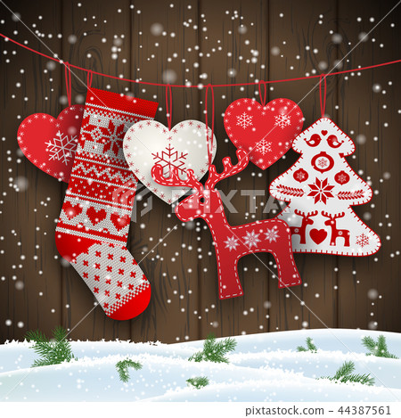 Christmas folklore decorations hanging in front of 44387561