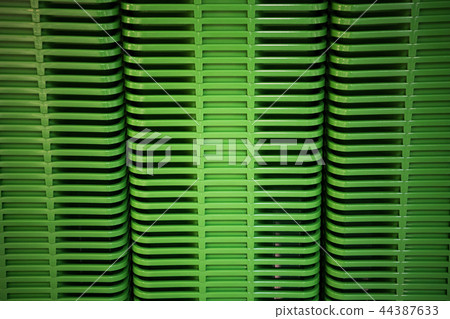 Green plastic home containers tower at store 44387633