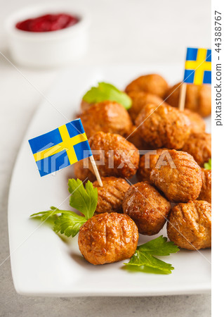 Swedish traditional meatballs on white plate.  Swedish traditional meatballs on white plate.  44388767